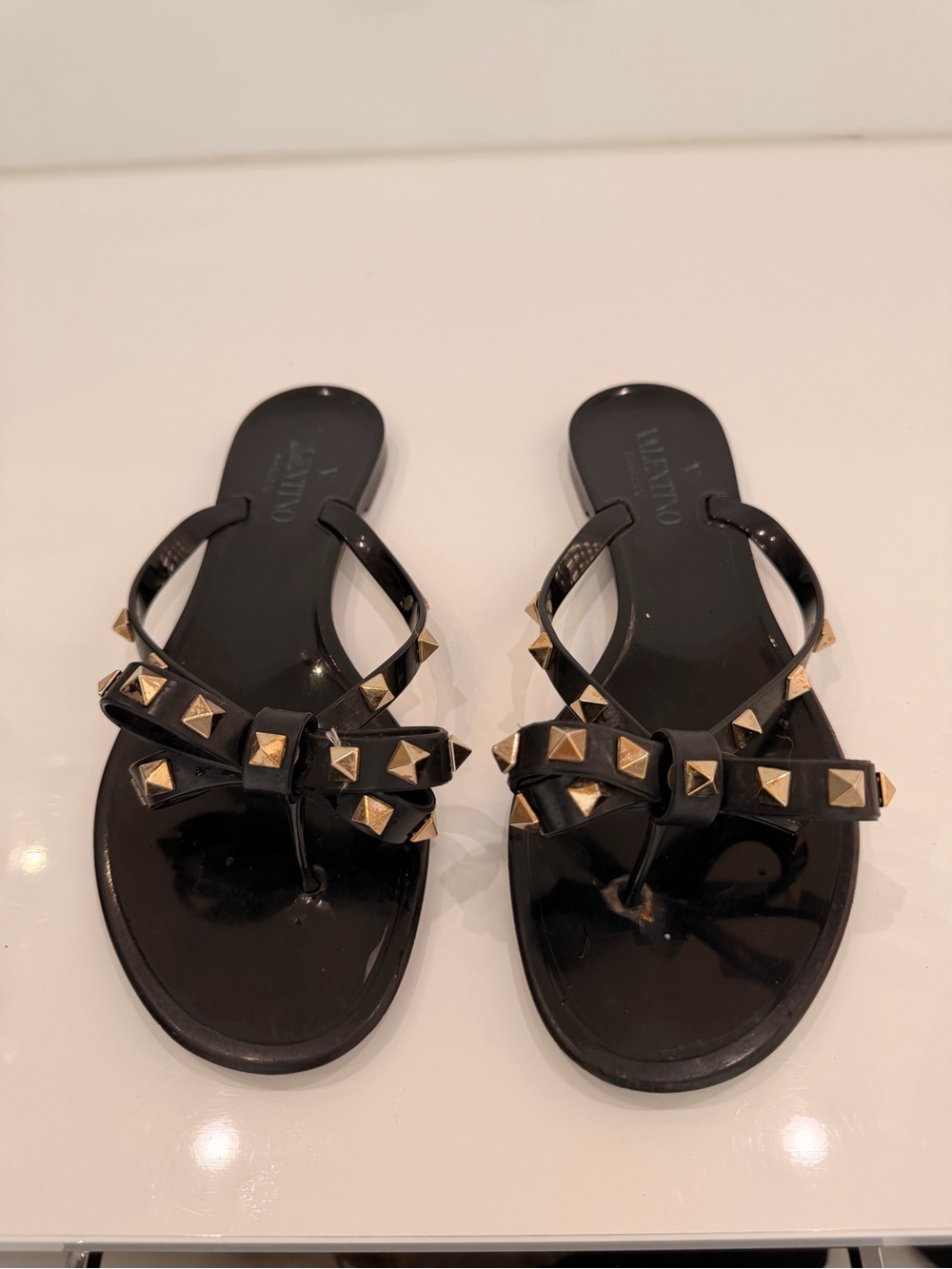 Valentino Black Jelly Bow Sandals with Gold Rockstuds